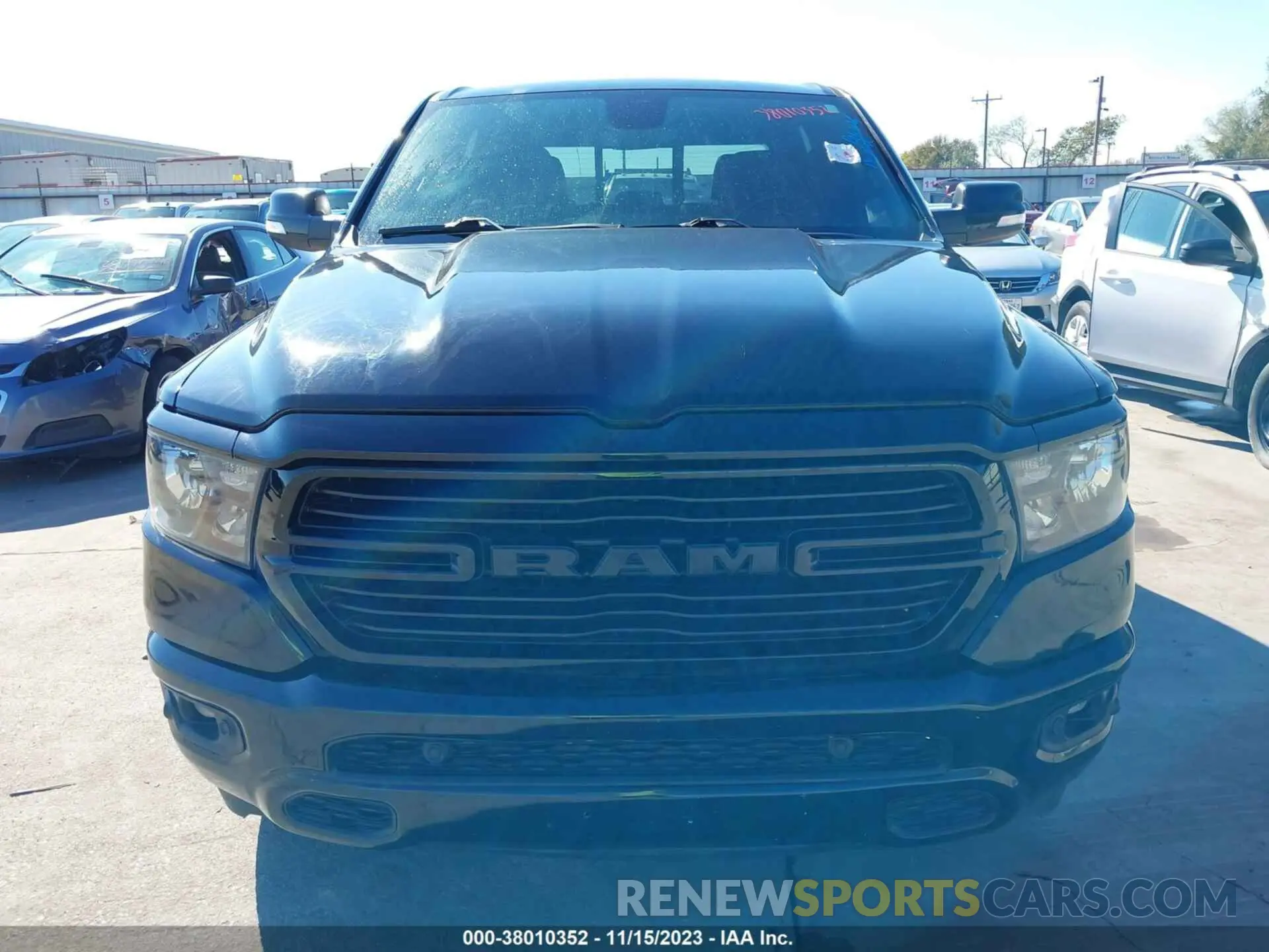 12 Photograph of a damaged car 1C6RREFT9MN574110 RAM 1500 2021