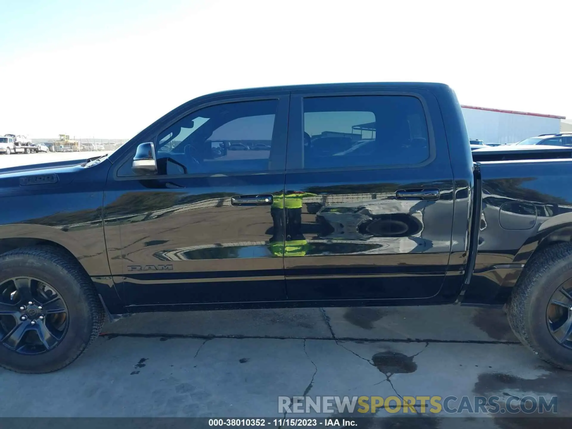 14 Photograph of a damaged car 1C6RREFT9MN574110 RAM 1500 2021