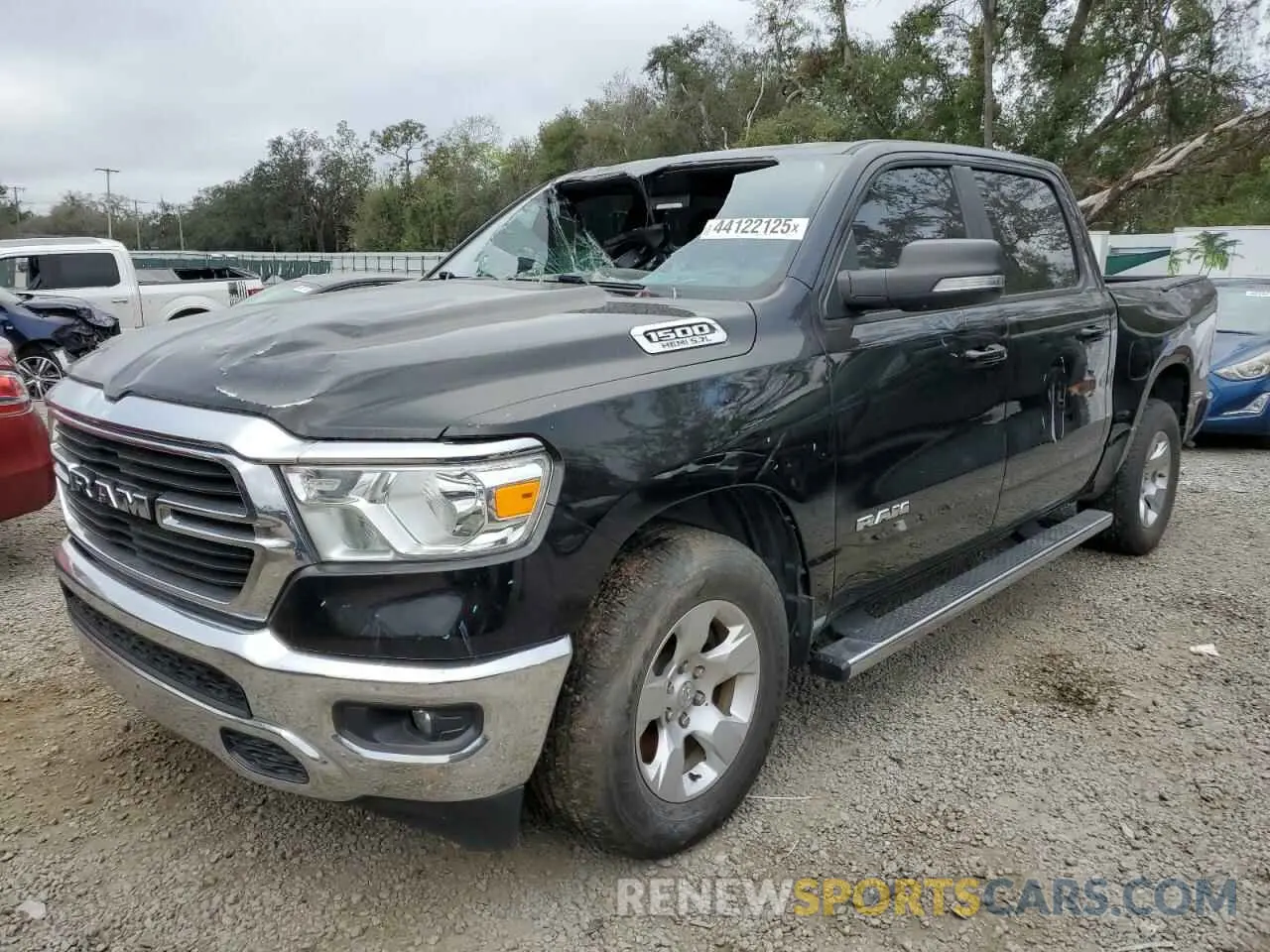 1 Photograph of a damaged car 1C6RREFT9MN574642 RAM 1500 2021