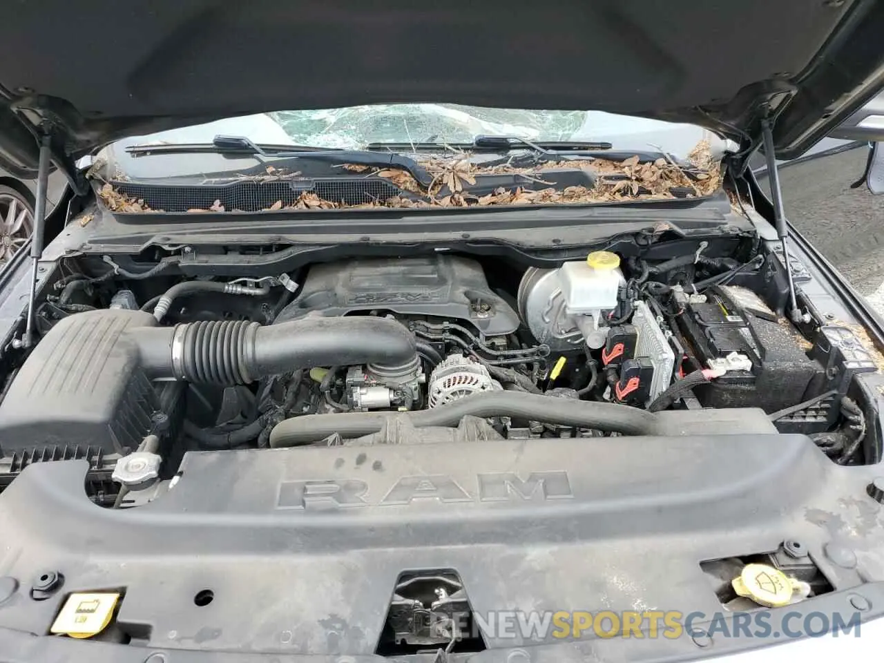 11 Photograph of a damaged car 1C6RREFT9MN574642 RAM 1500 2021