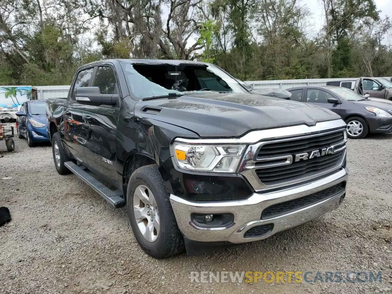 4 Photograph of a damaged car 1C6RREFT9MN574642 RAM 1500 2021