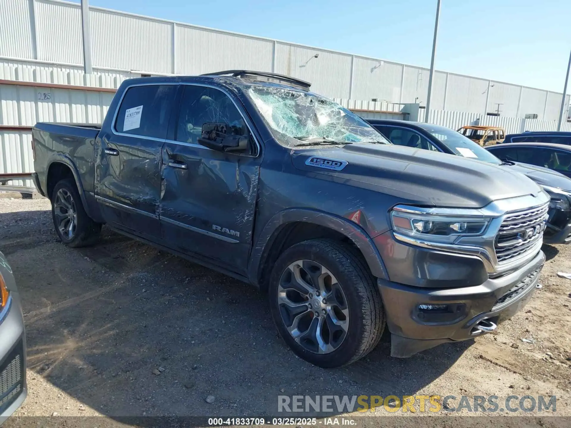 1 Photograph of a damaged car 1C6RREHT1MN711781 RAM 1500 2021