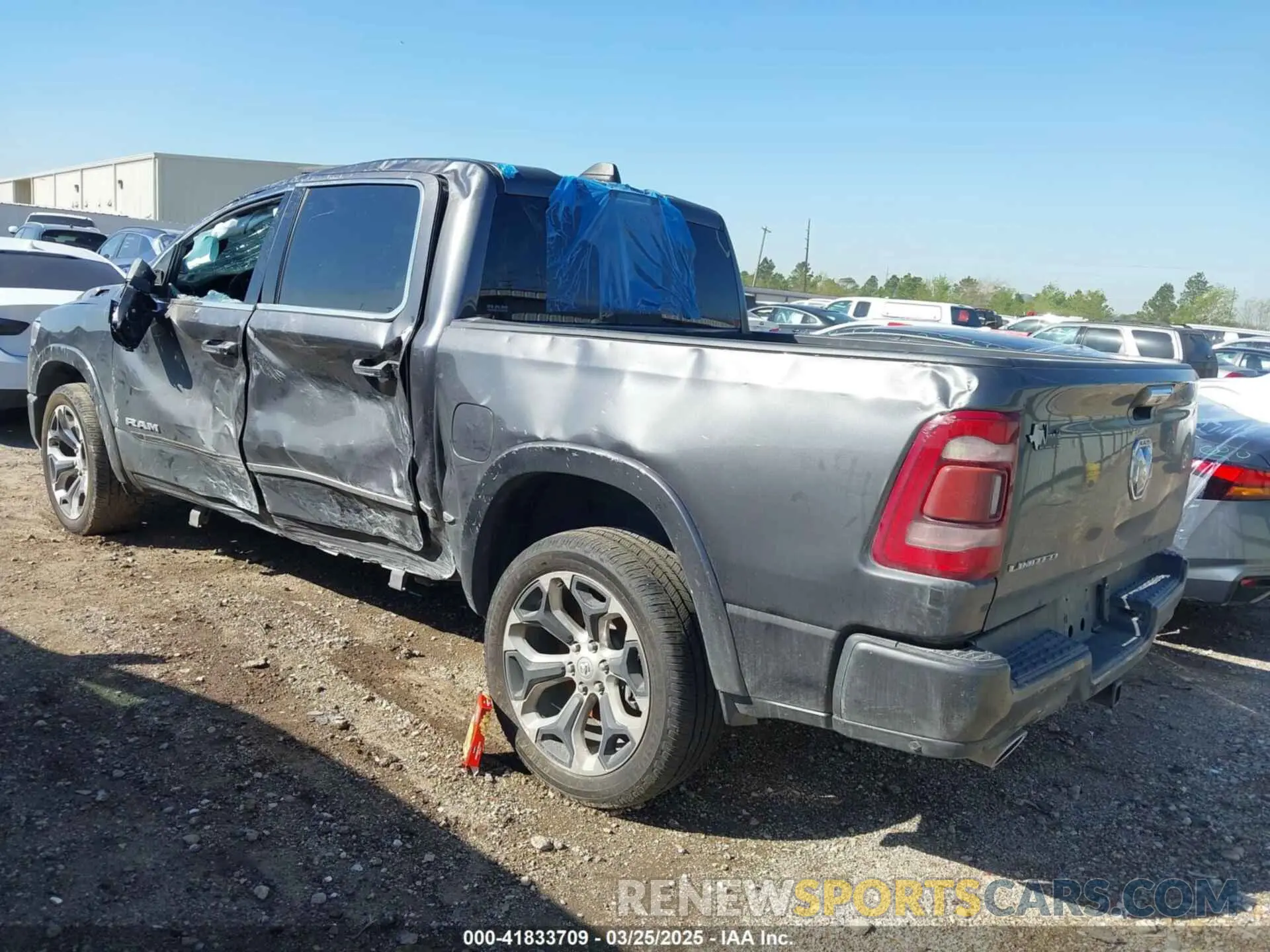 3 Photograph of a damaged car 1C6RREHT1MN711781 RAM 1500 2021