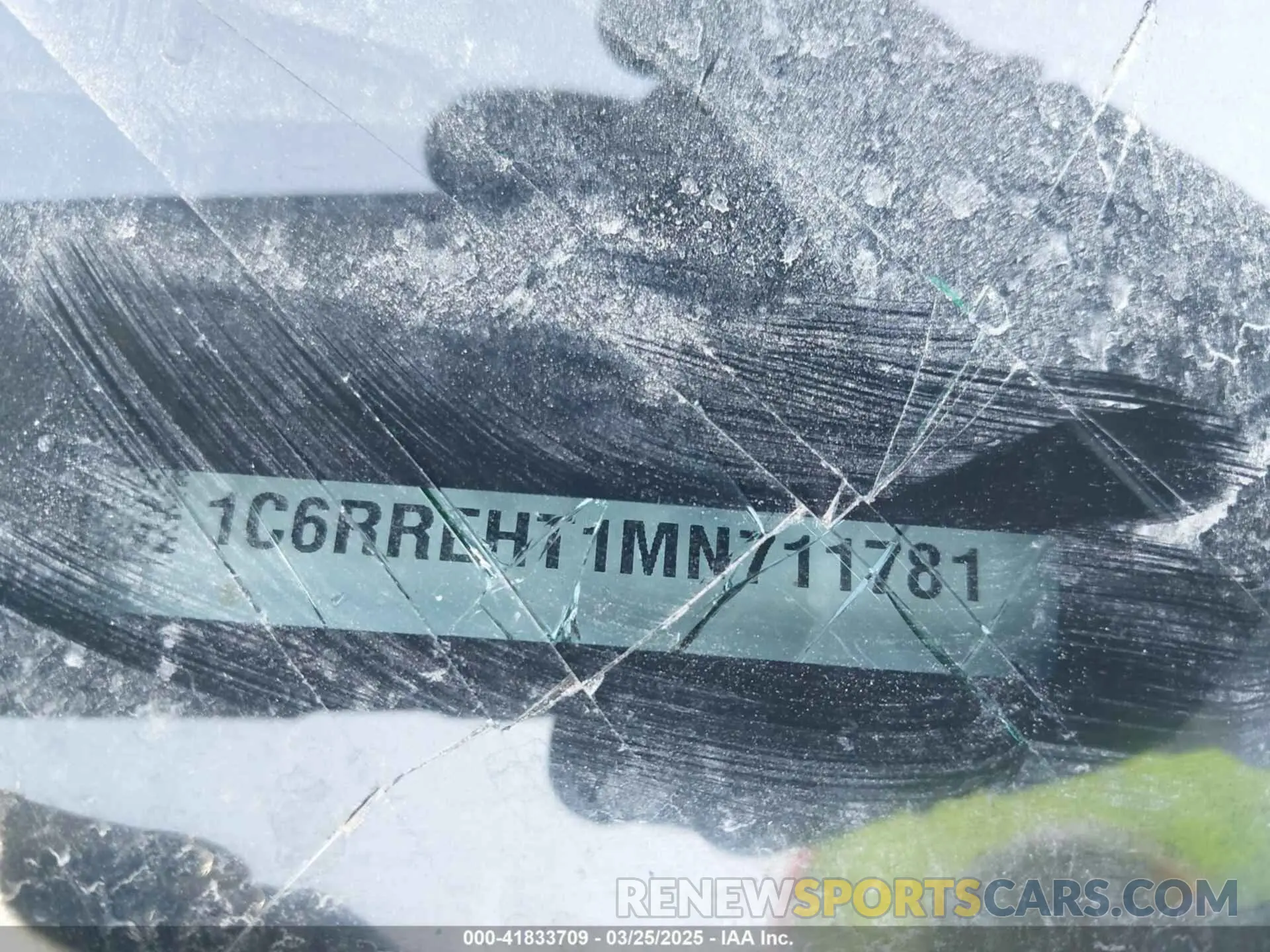 9 Photograph of a damaged car 1C6RREHT1MN711781 RAM 1500 2021