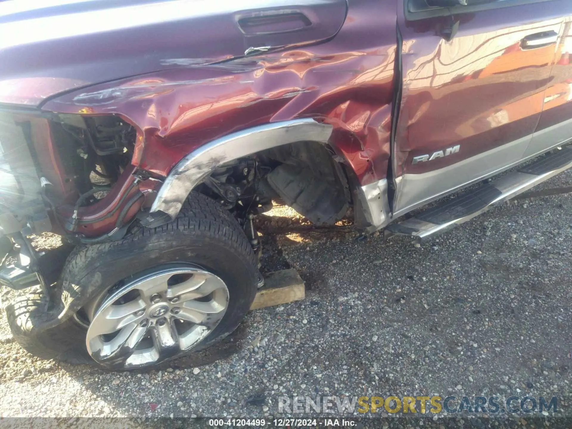 19 Photograph of a damaged car 1C6RREJT1MN814760 RAM 1500 2021