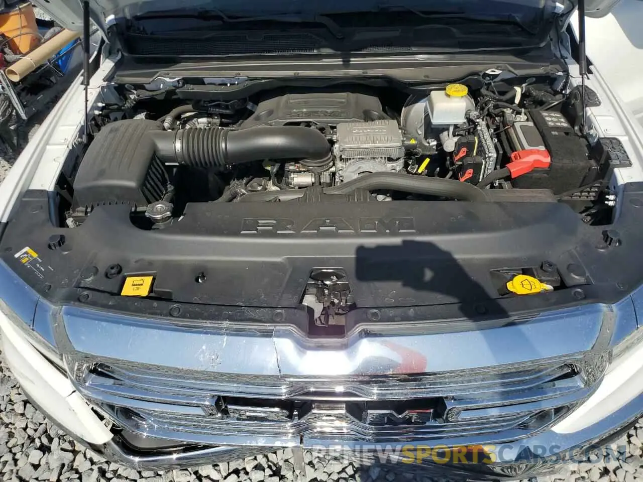 11 Photograph of a damaged car 1C6RREJT4MN820424 RAM 1500 2021