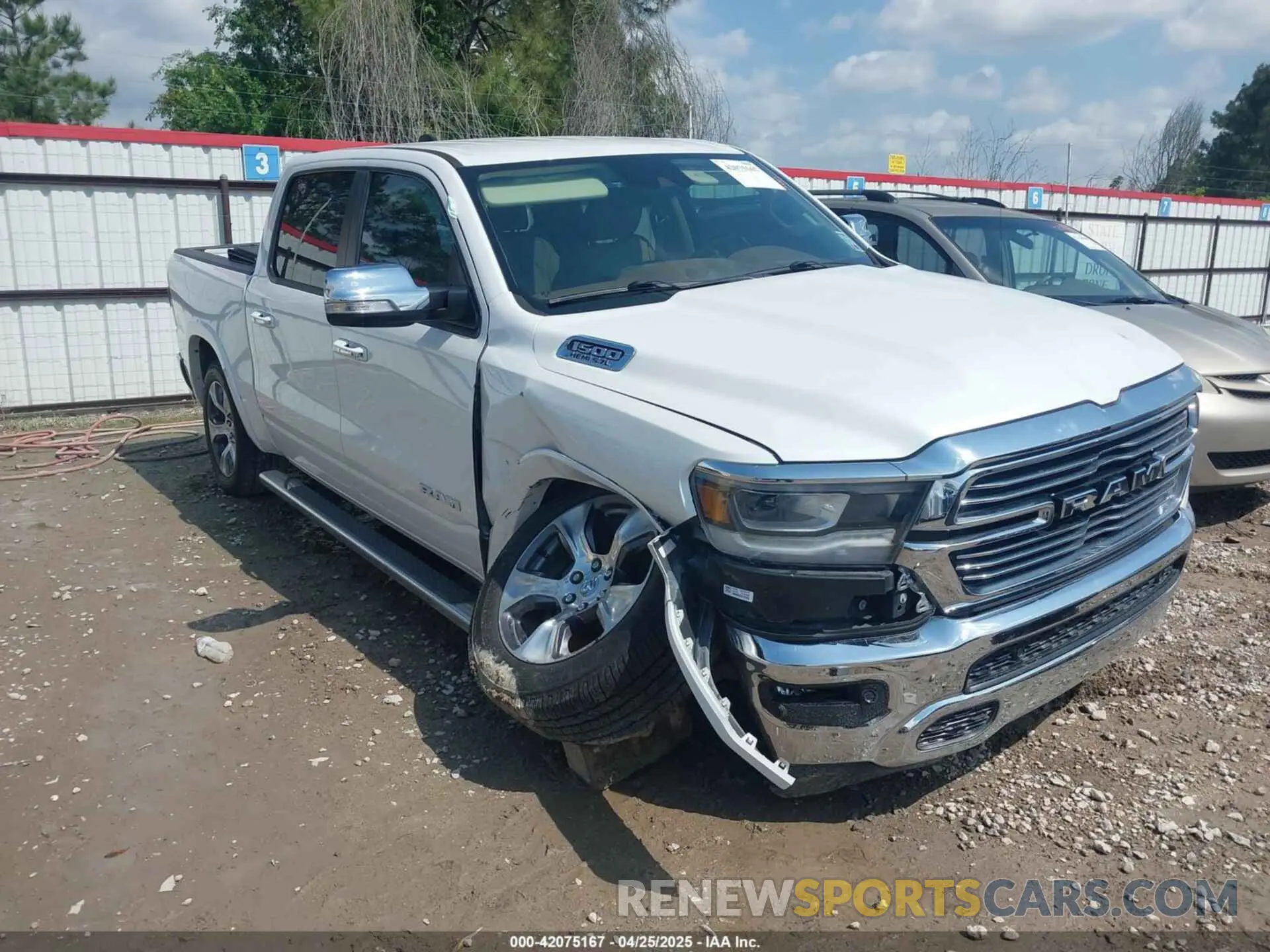 1 Photograph of a damaged car 1C6RREJT6MN628714 RAM 1500 2021