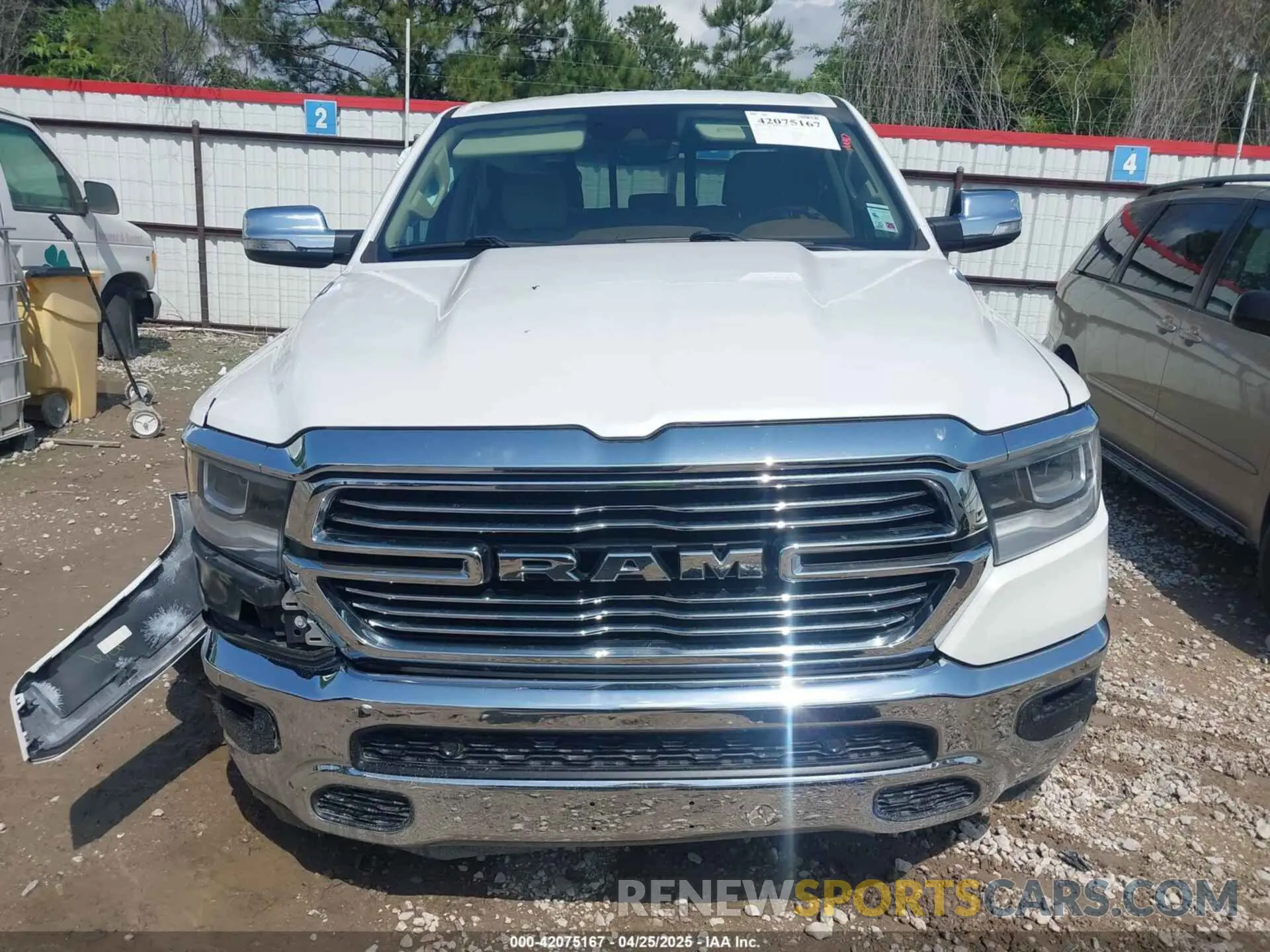 12 Photograph of a damaged car 1C6RREJT6MN628714 RAM 1500 2021