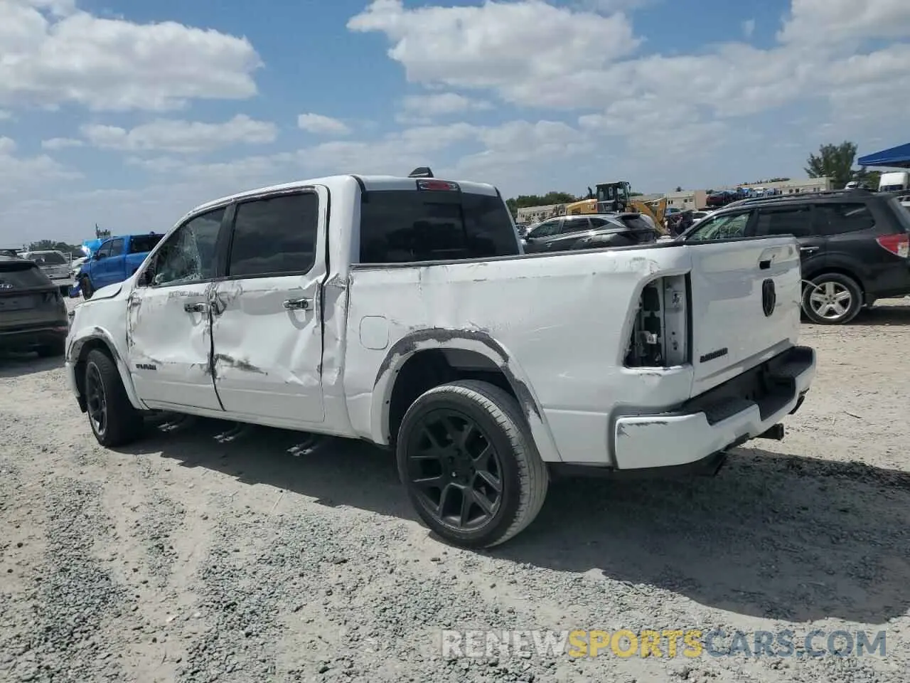 2 Photograph of a damaged car 1C6RREJTXMN814823 RAM 1500 2021