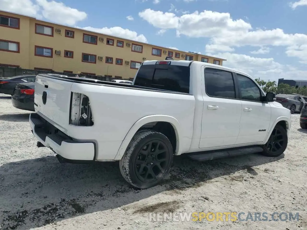 3 Photograph of a damaged car 1C6RREJTXMN814823 RAM 1500 2021