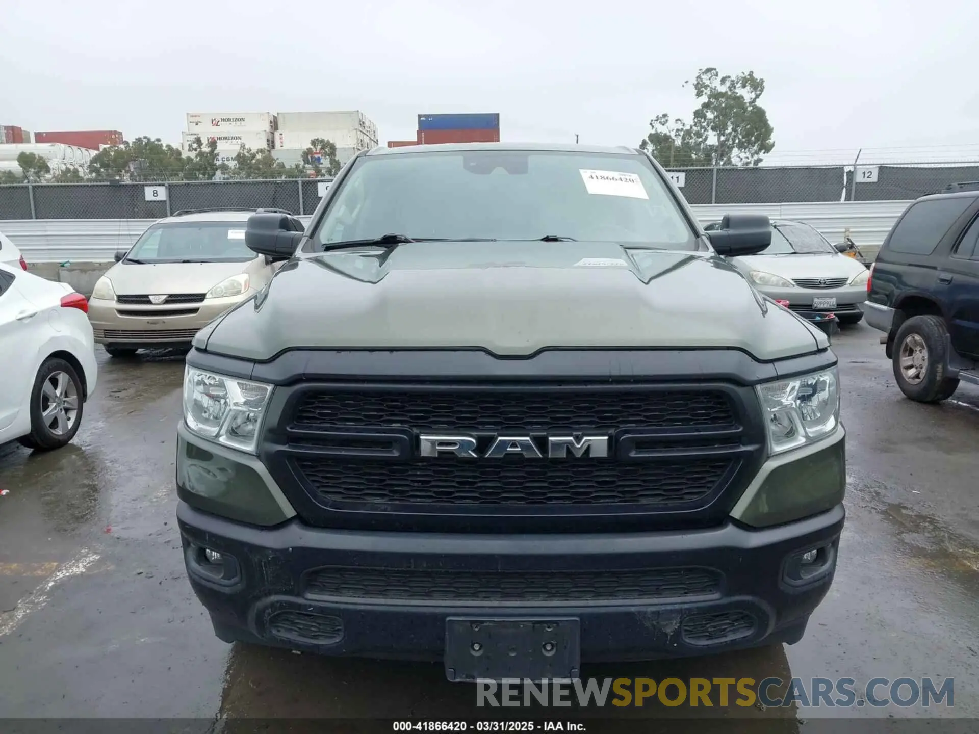12 Photograph of a damaged car 1C6RRFCGXMN714260 RAM 1500 2021