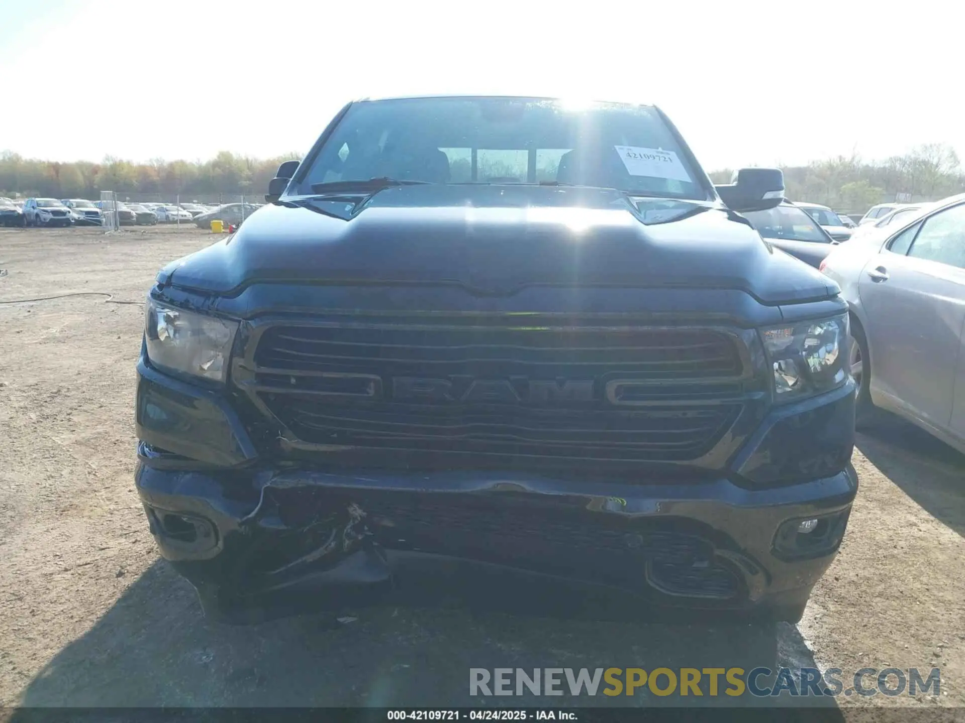 12 Photograph of a damaged car 1C6RRFFG2MN547923 RAM 1500 2021