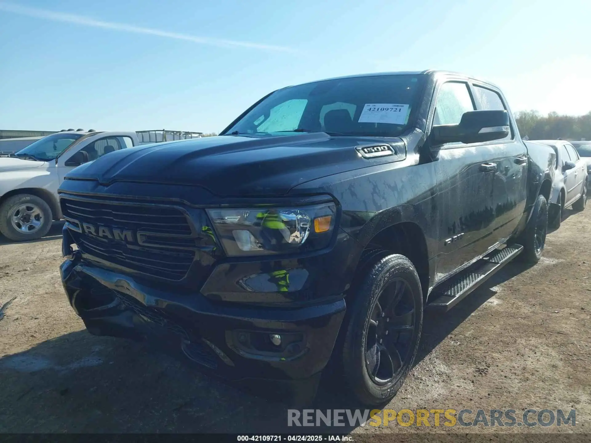 2 Photograph of a damaged car 1C6RRFFG2MN547923 RAM 1500 2021