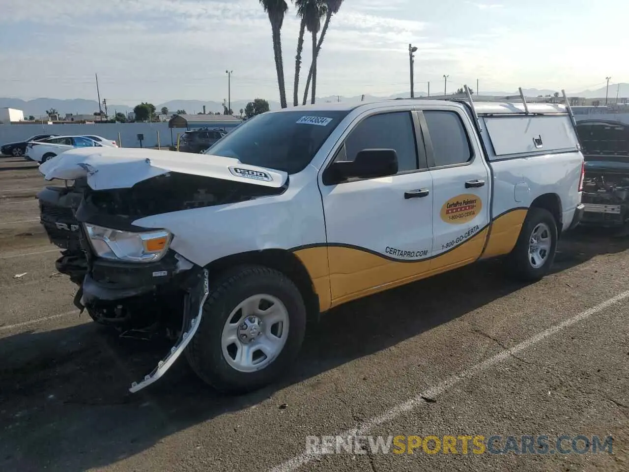1 Photograph of a damaged car 1C6SRECG2MN609921 RAM 1500 2021