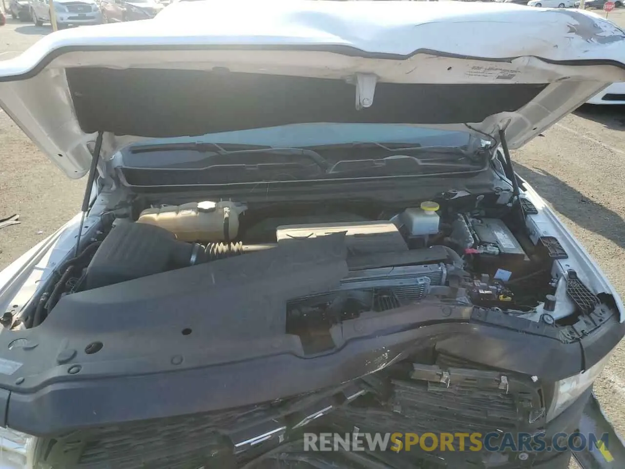 11 Photograph of a damaged car 1C6SRECG2MN609921 RAM 1500 2021