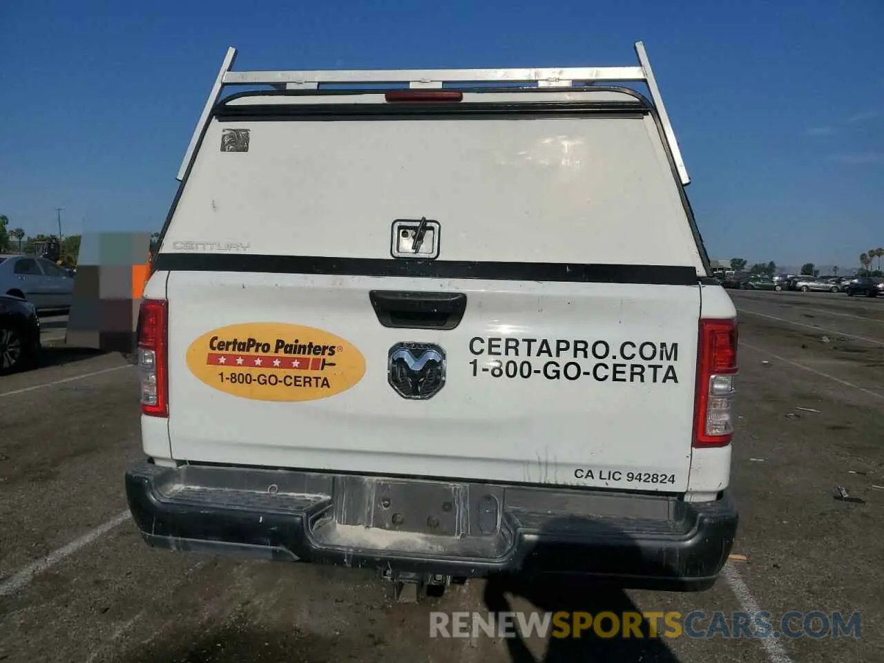 6 Photograph of a damaged car 1C6SRECG2MN609921 RAM 1500 2021