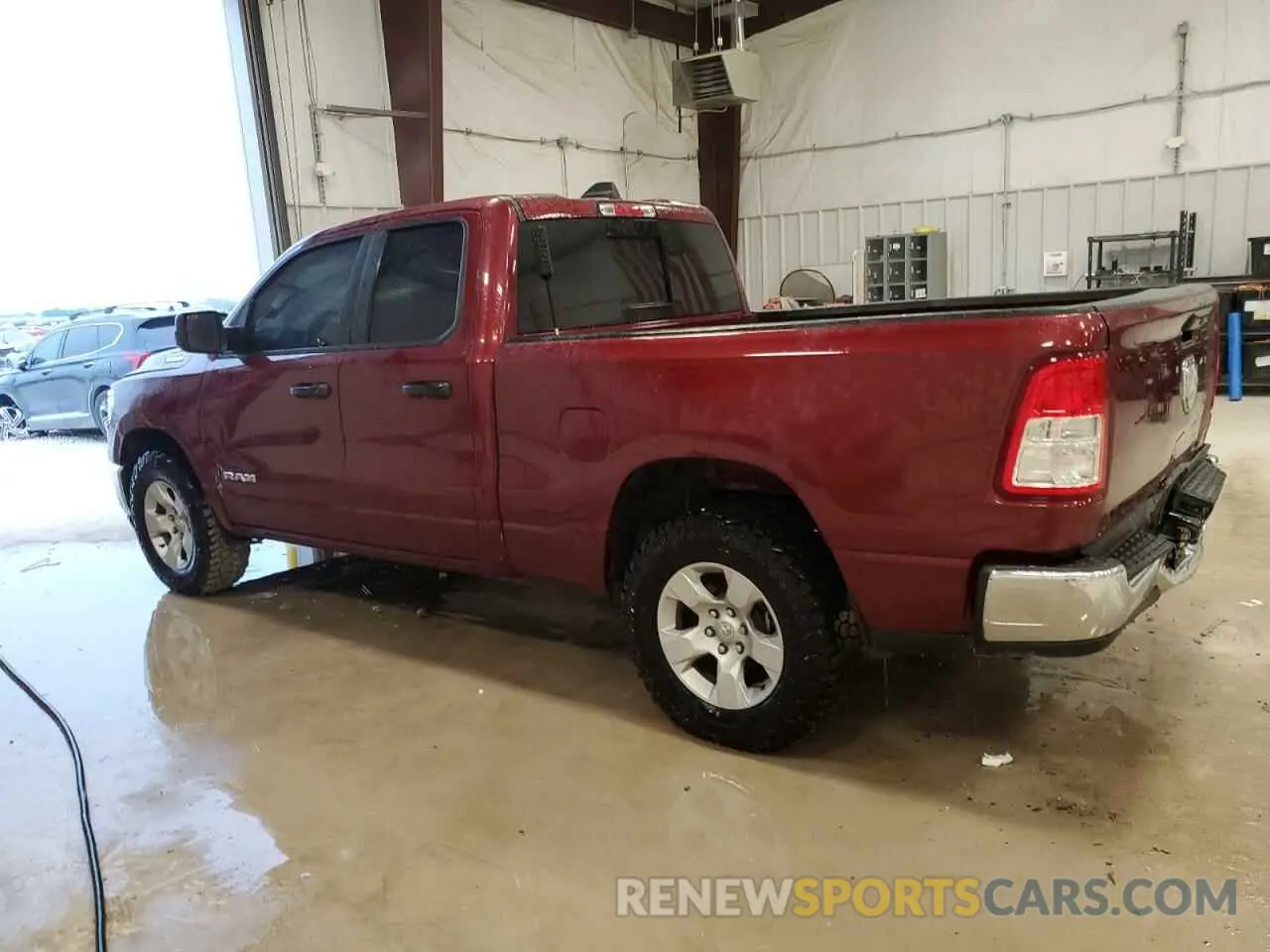 2 Photograph of a damaged car 1C6SRECG8MN543147 RAM 1500 2021