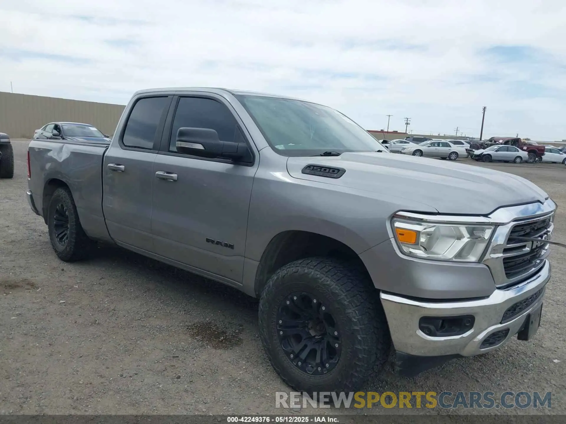 1 Photograph of a damaged car 1C6SRFBT1MN622633 RAM 1500 2021