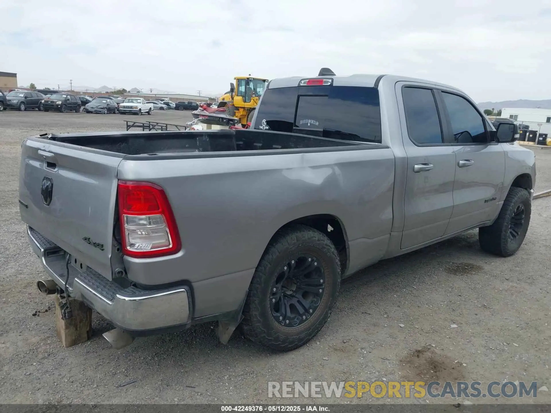 4 Photograph of a damaged car 1C6SRFBT1MN622633 RAM 1500 2021