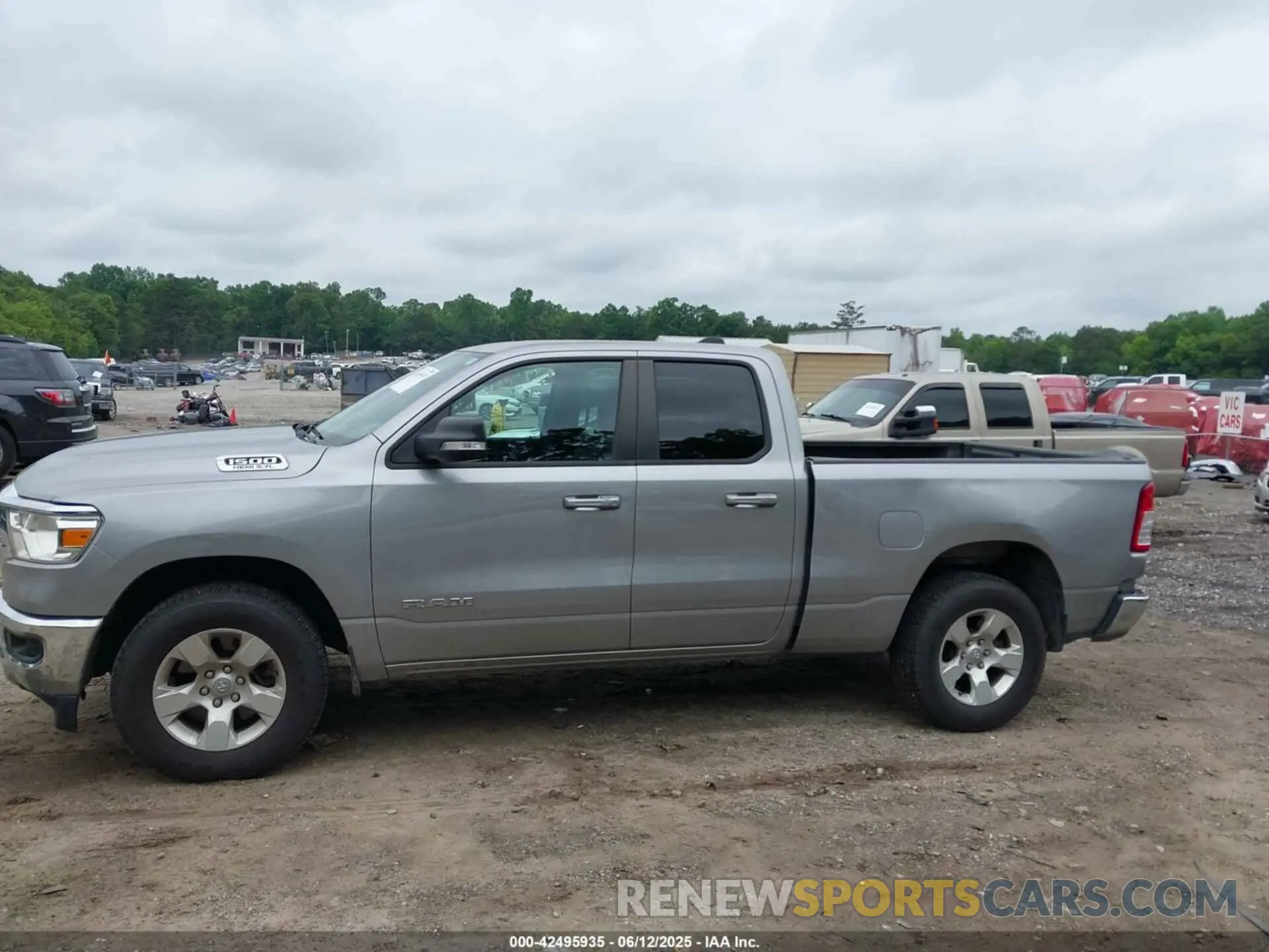 14 Photograph of a damaged car 1C6SRFBT1MN727401 RAM 1500 2021
