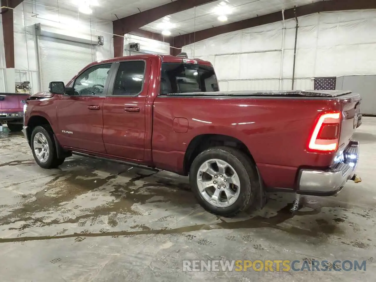 2 Photograph of a damaged car 1C6SRFBT2MN617506 RAM 1500 2021