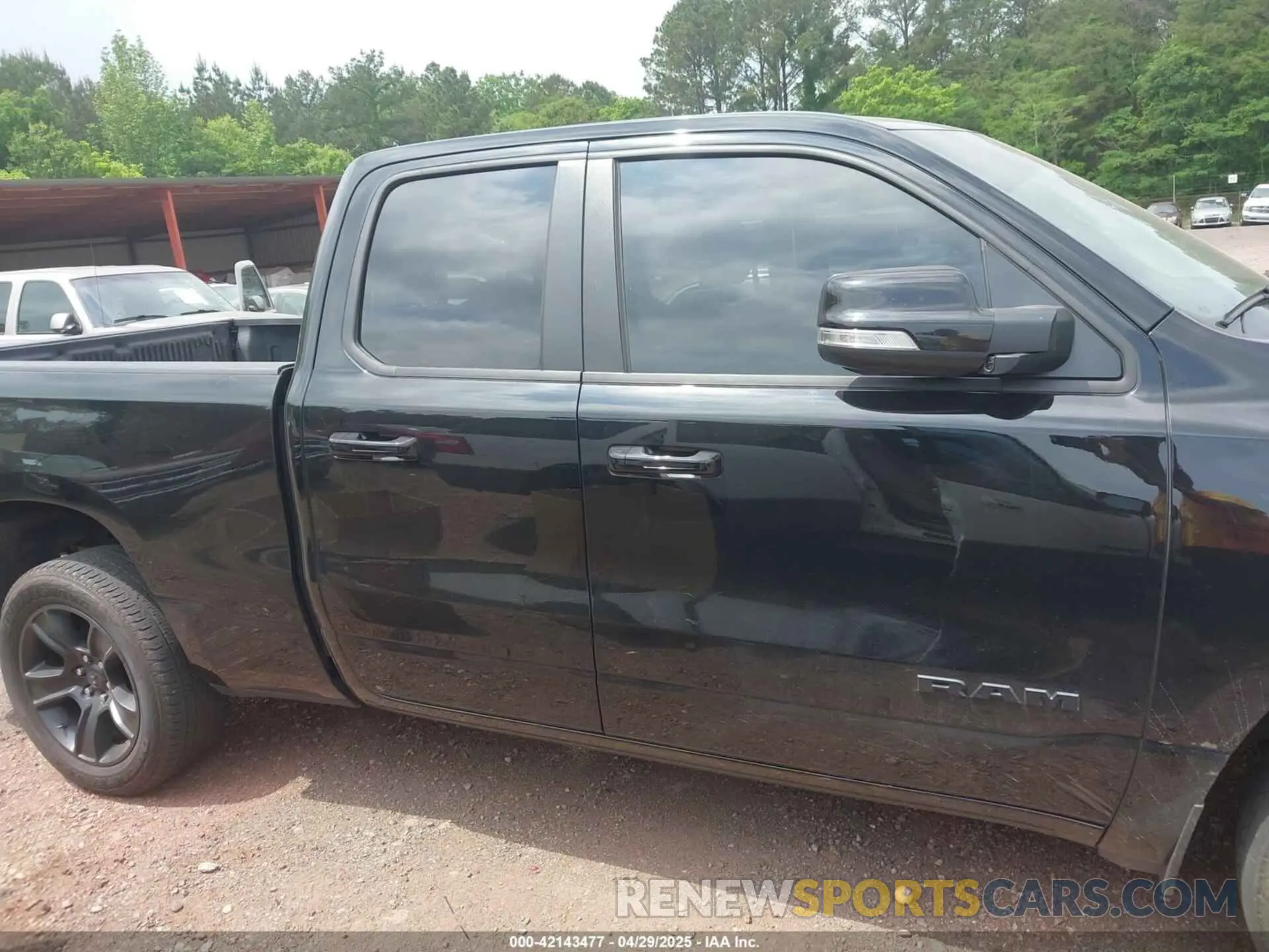 12 Photograph of a damaged car 1C6SRFBTXMN561041 RAM 1500 2021