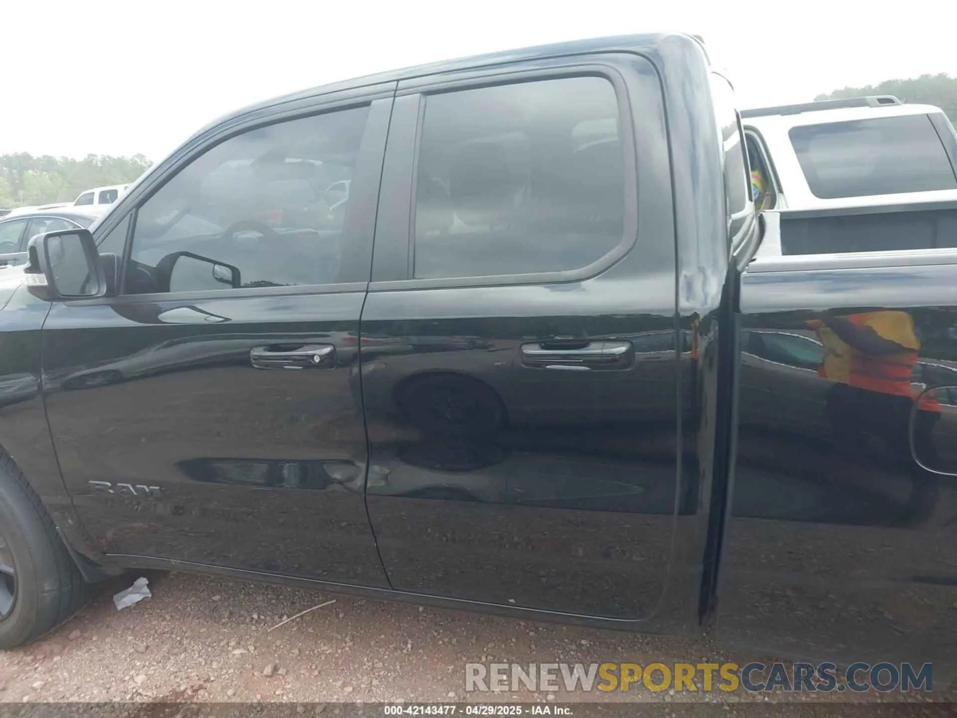 13 Photograph of a damaged car 1C6SRFBTXMN561041 RAM 1500 2021