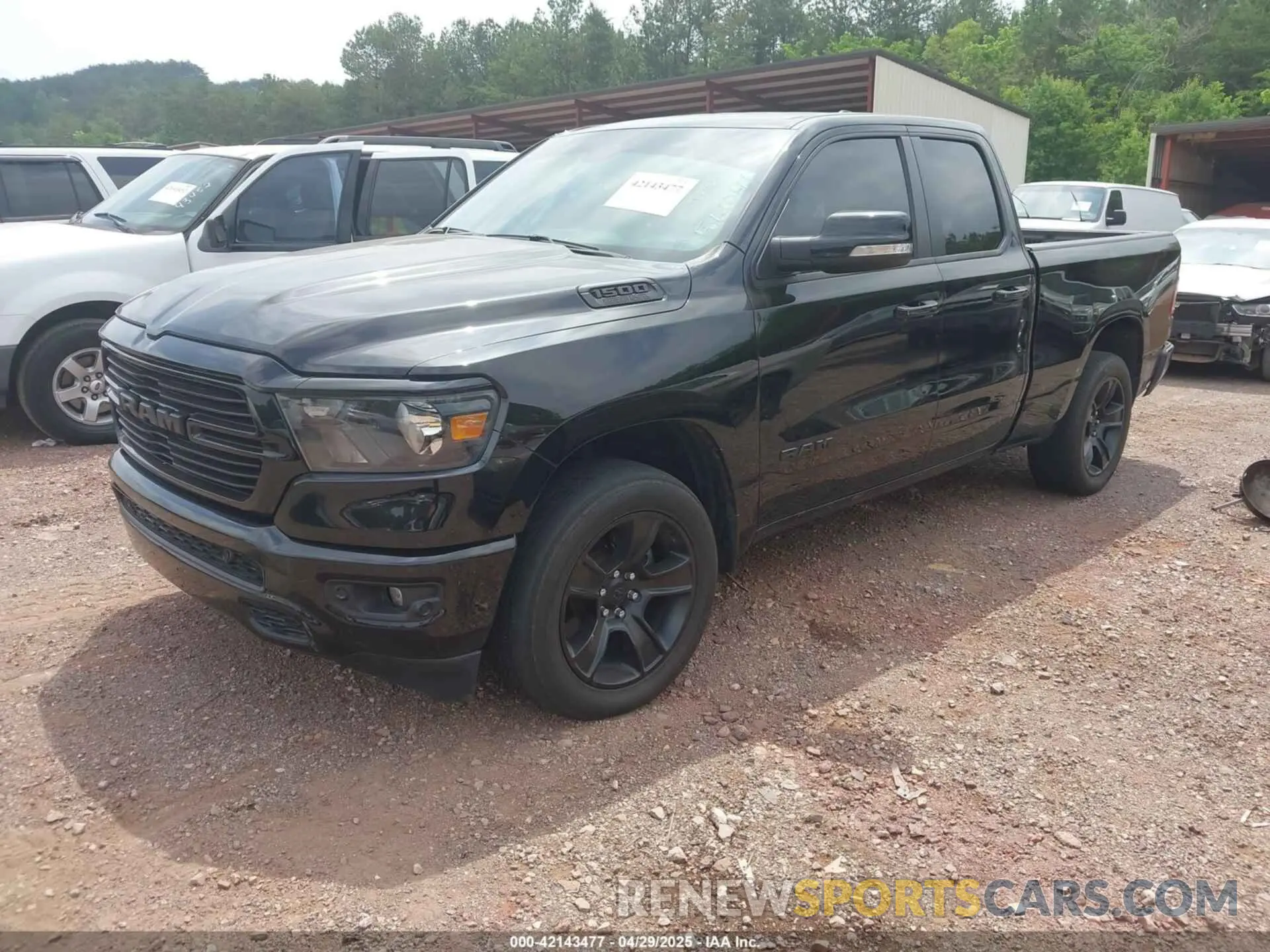 2 Photograph of a damaged car 1C6SRFBTXMN561041 RAM 1500 2021