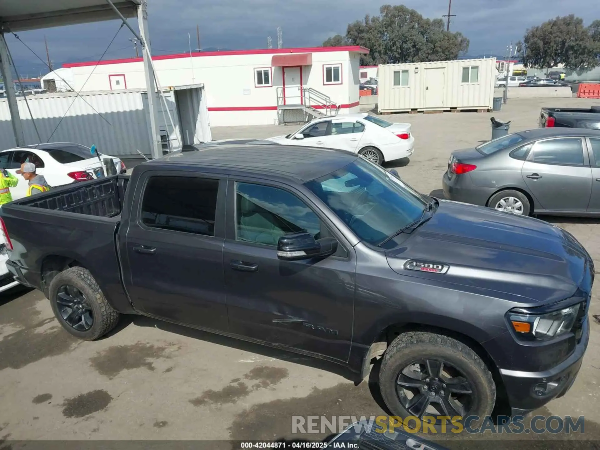 13 Photograph of a damaged car 1C6SRFFM3MN733915 RAM 1500 2021