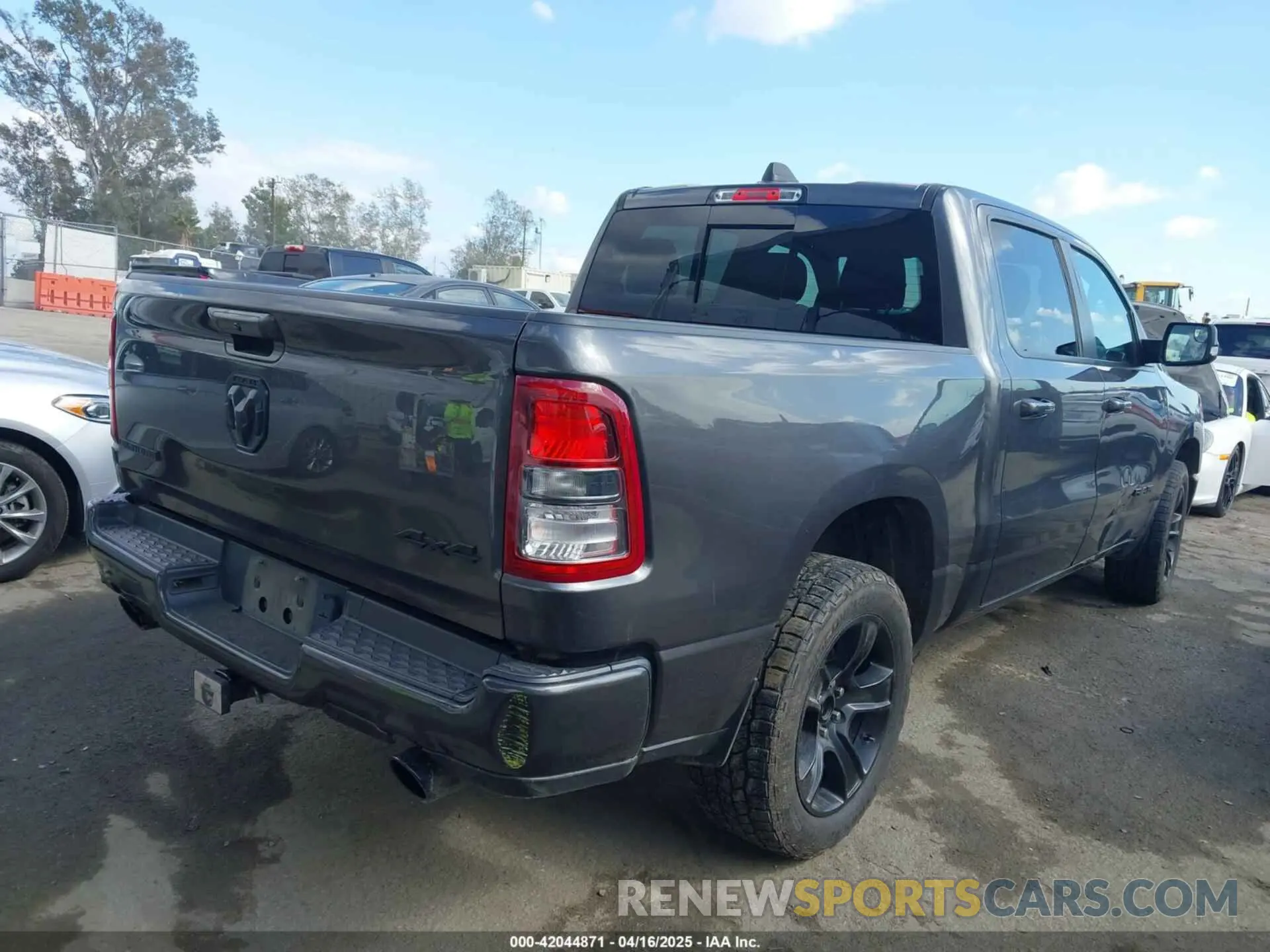 4 Photograph of a damaged car 1C6SRFFM3MN733915 RAM 1500 2021