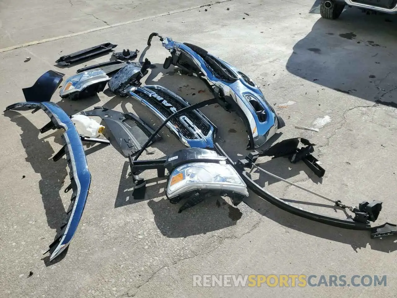 12 Photograph of a damaged car 1C6SRFFM3MN822447 RAM 1500 2021