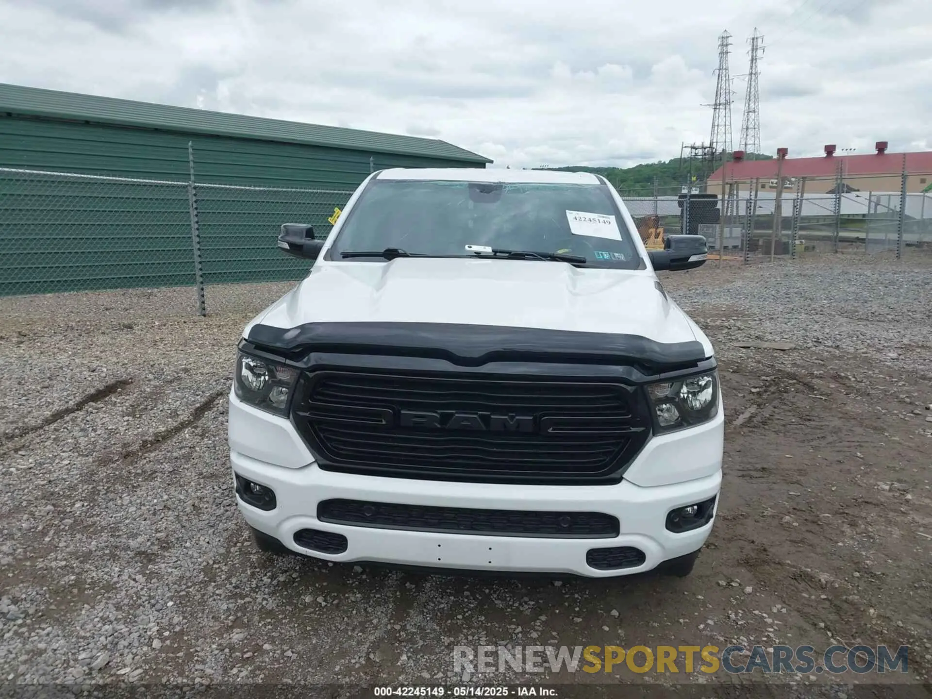 12 Photograph of a damaged car 1C6SRFFT0MN655651 RAM 1500 2021