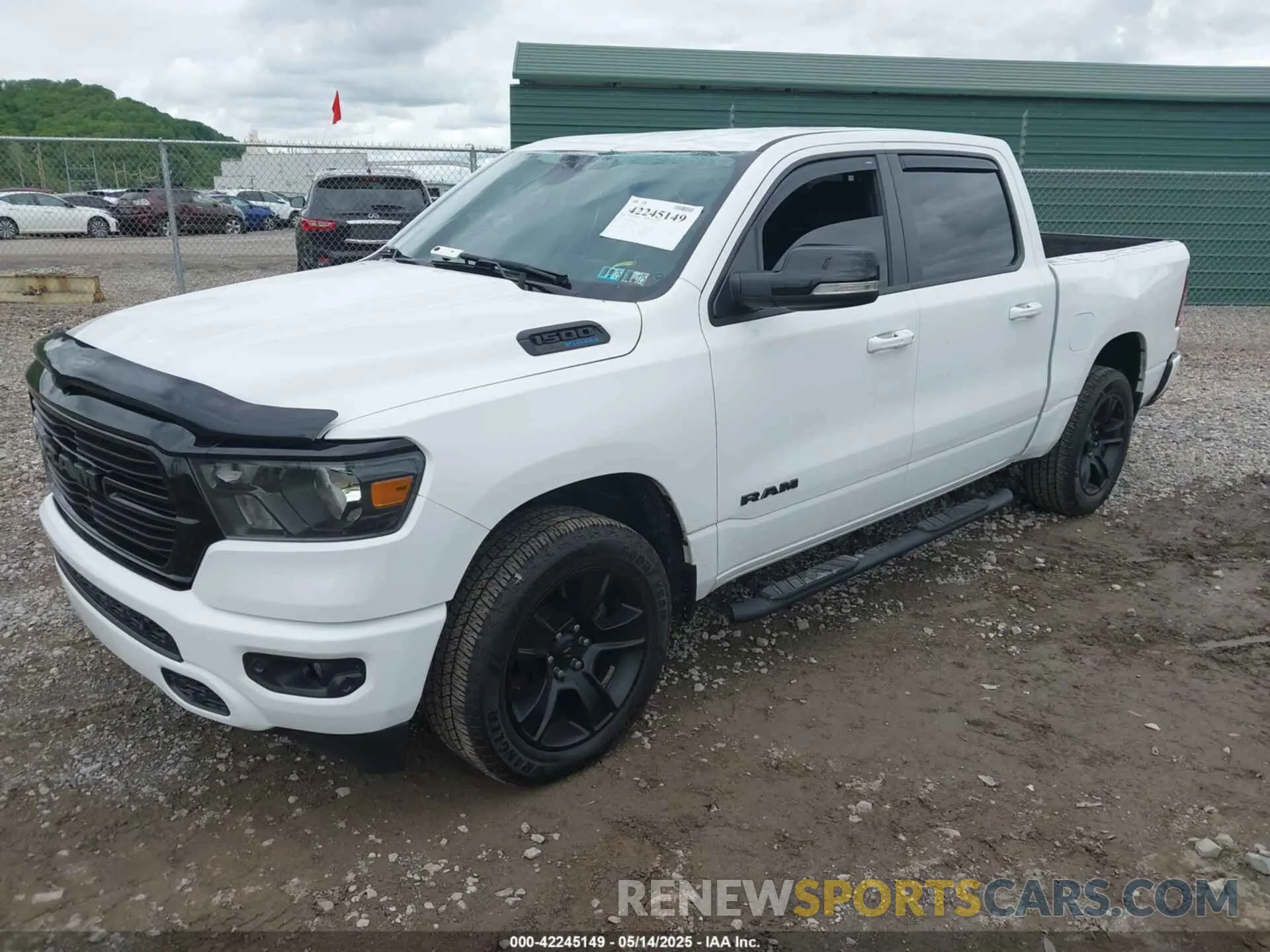 2 Photograph of a damaged car 1C6SRFFT0MN655651 RAM 1500 2021