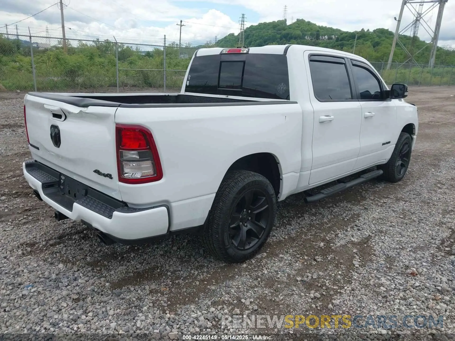 4 Photograph of a damaged car 1C6SRFFT0MN655651 RAM 1500 2021