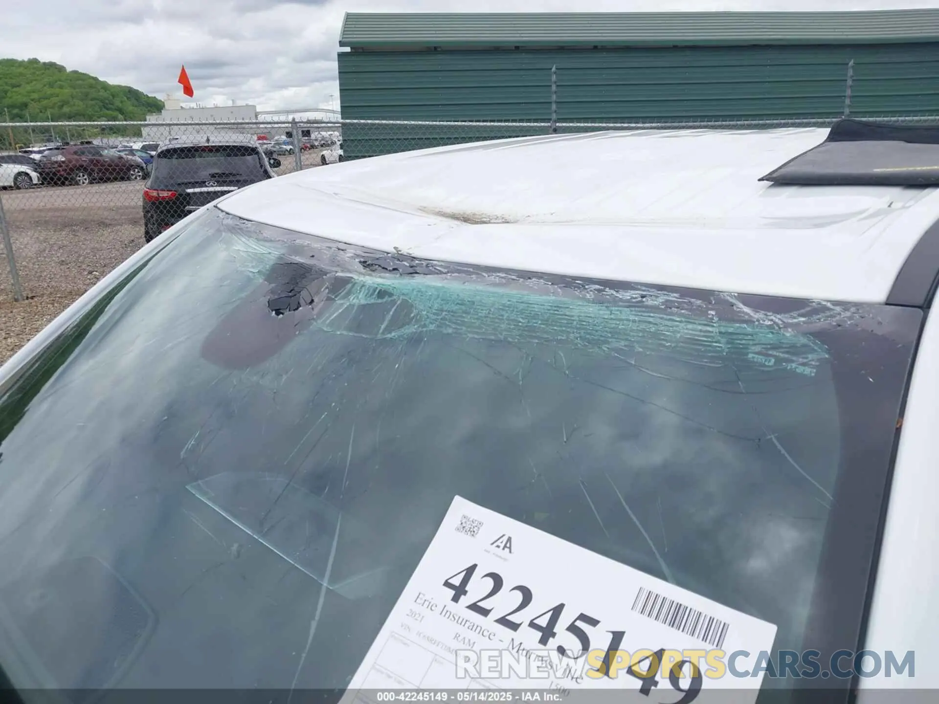 6 Photograph of a damaged car 1C6SRFFT0MN655651 RAM 1500 2021