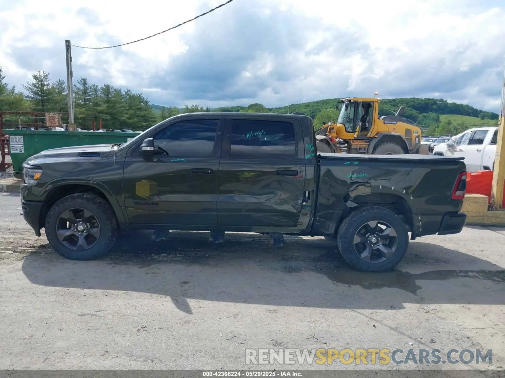 14 Photograph of a damaged car 1C6SRFFT1MN669218 RAM 1500 2021