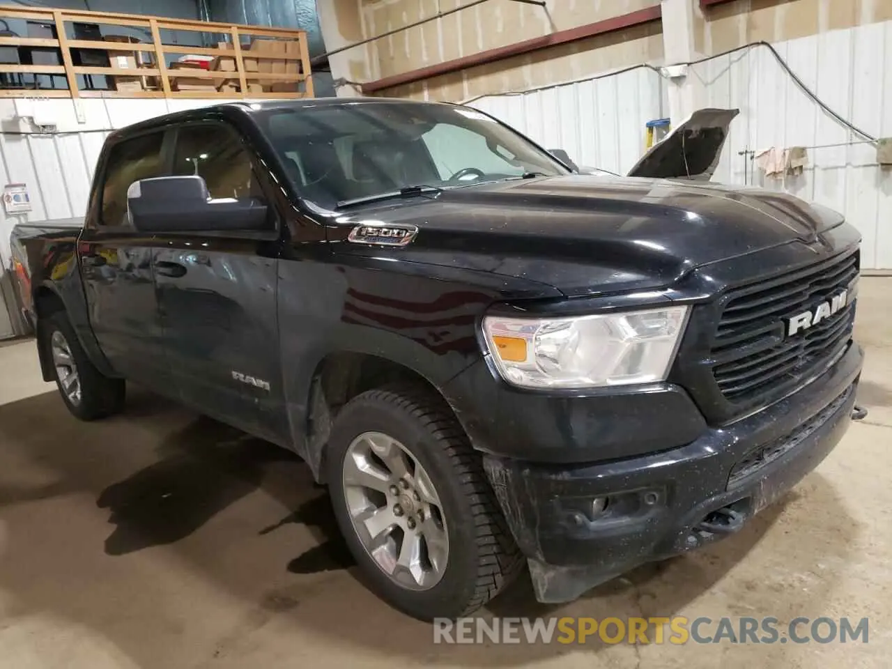 4 Photograph of a damaged car 1C6SRFFT1MN804715 RAM 1500 2021