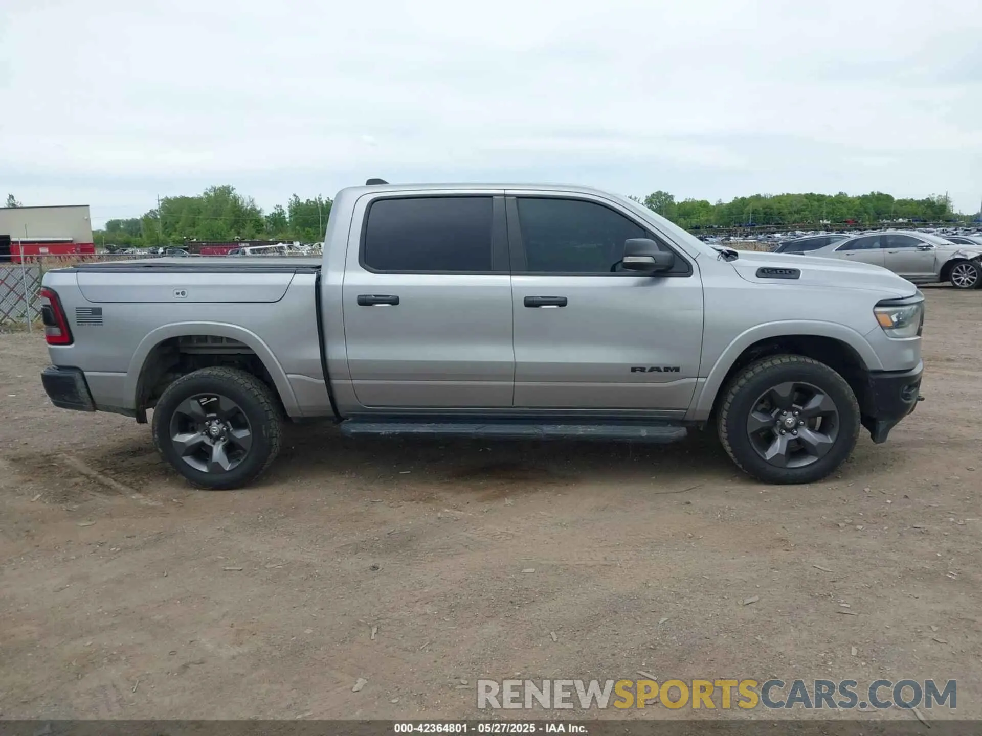 13 Photograph of a damaged car 1C6SRFFT2MN597123 RAM 1500 2021