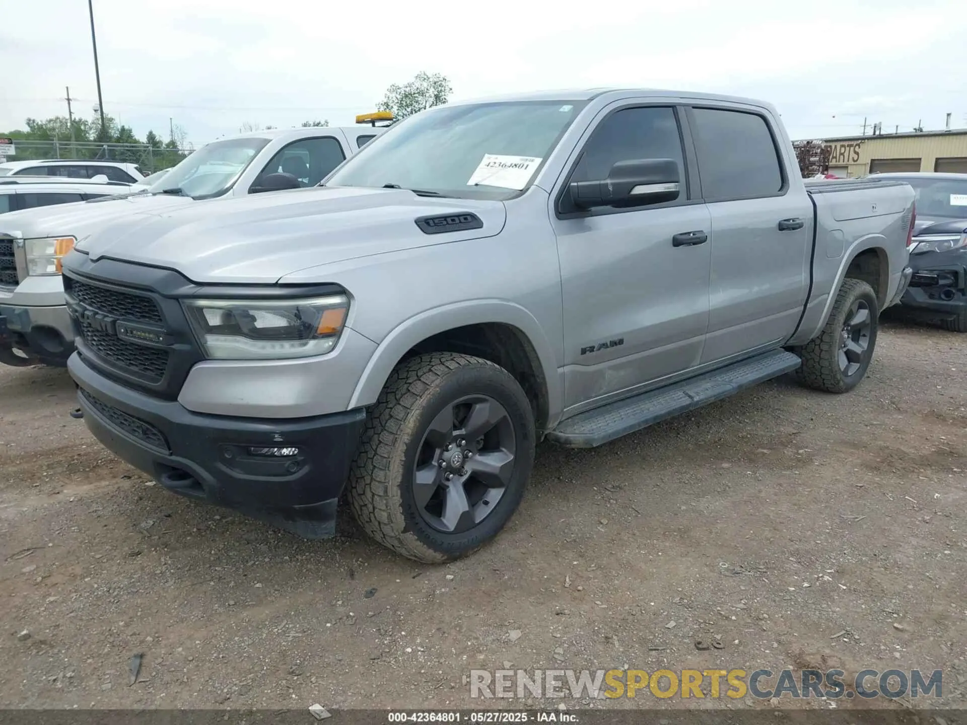 2 Photograph of a damaged car 1C6SRFFT2MN597123 RAM 1500 2021