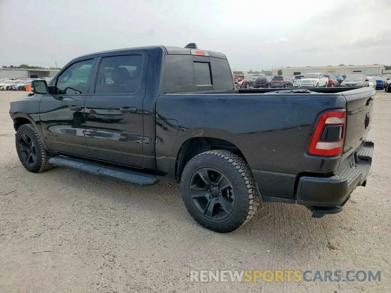 2 Photograph of a damaged car 1C6SRFFT2MN766640 RAM 1500 2021