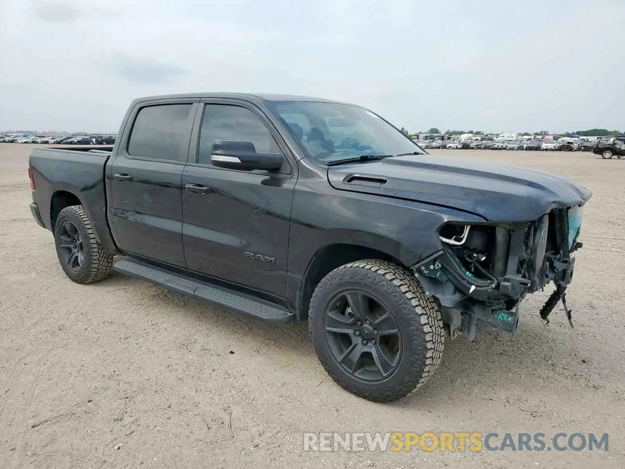 4 Photograph of a damaged car 1C6SRFFT2MN766640 RAM 1500 2021