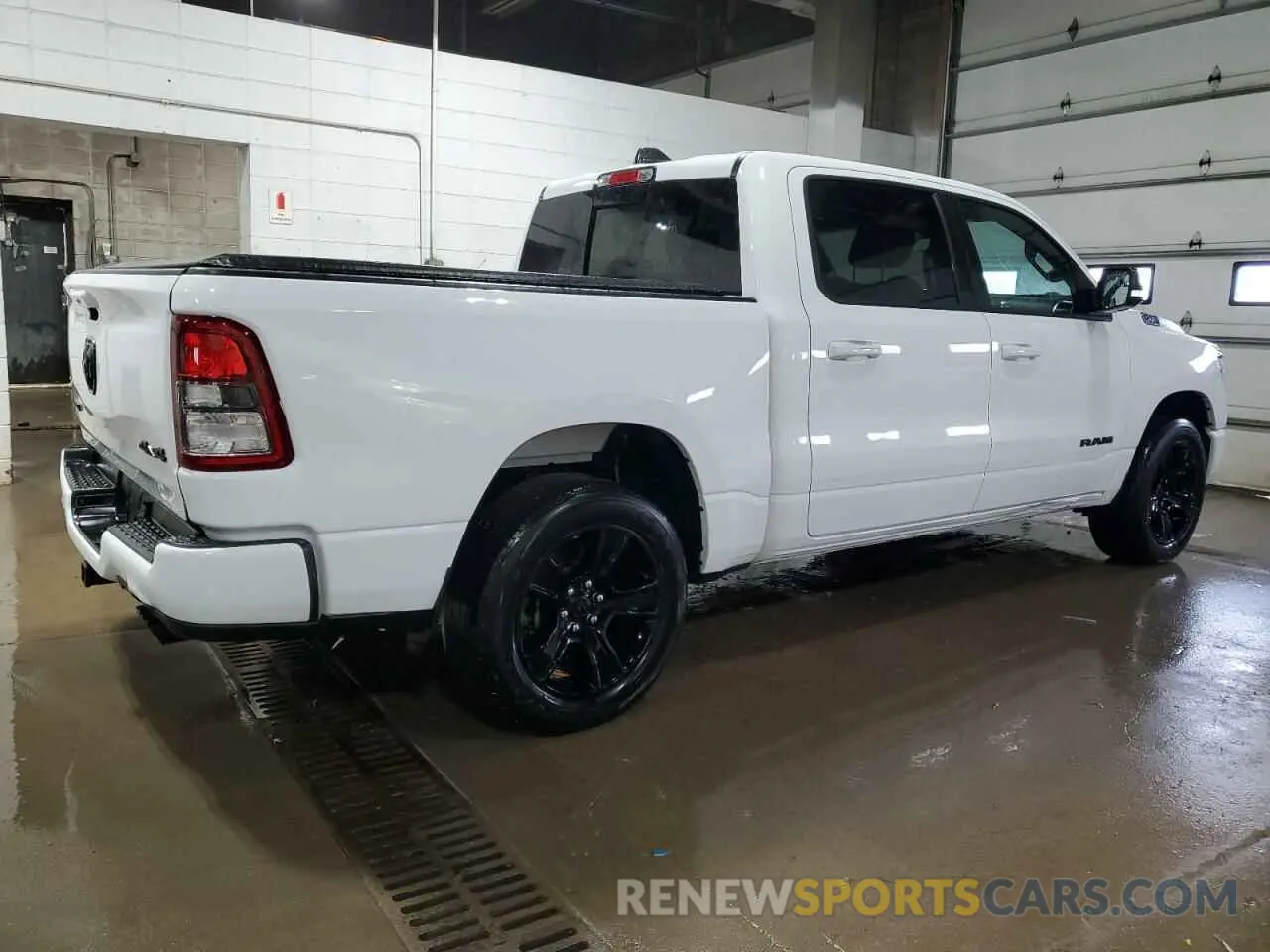 3 Photograph of a damaged car 1C6SRFFT3MN675148 RAM 1500 2021