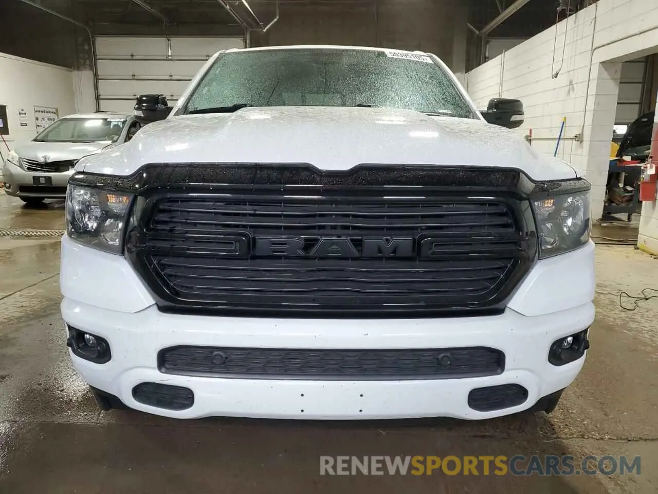 5 Photograph of a damaged car 1C6SRFFT3MN675148 RAM 1500 2021