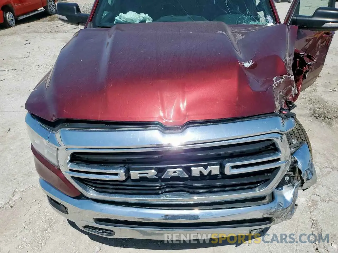 12 Photograph of a damaged car 1C6SRFFT4MN520933 RAM 1500 2021