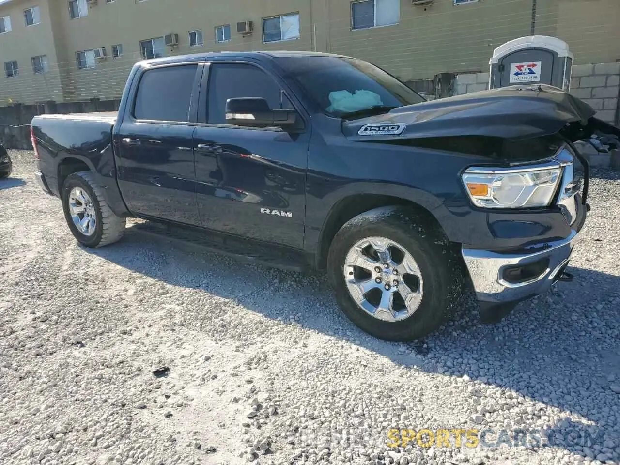 4 Photograph of a damaged car 1C6SRFFT4MN745448 RAM 1500 2021