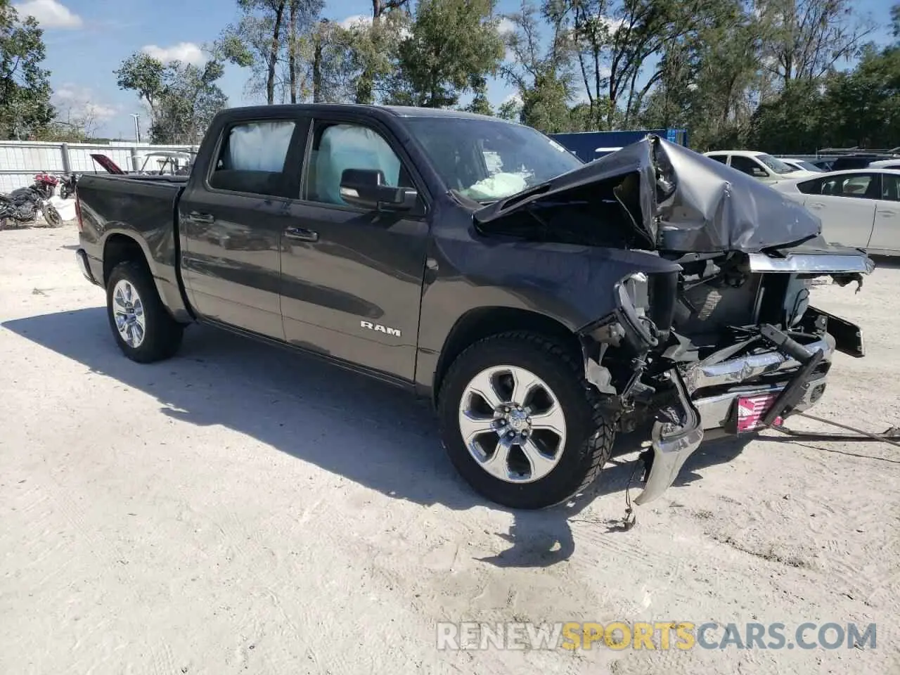 4 Photograph of a damaged car 1C6SRFFT5MN569414 RAM 1500 2021