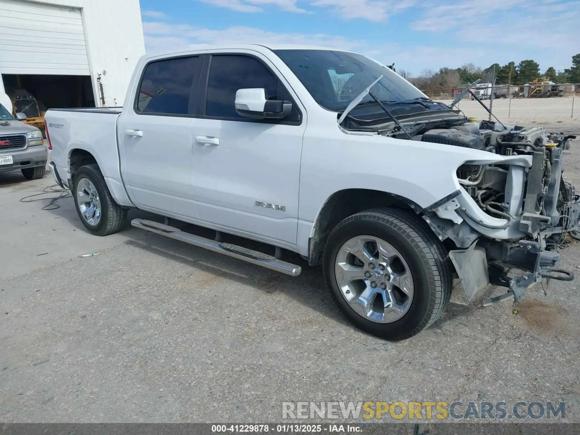 1 Photograph of a damaged car 1C6SRFFT5MN650476 RAM 1500 2021