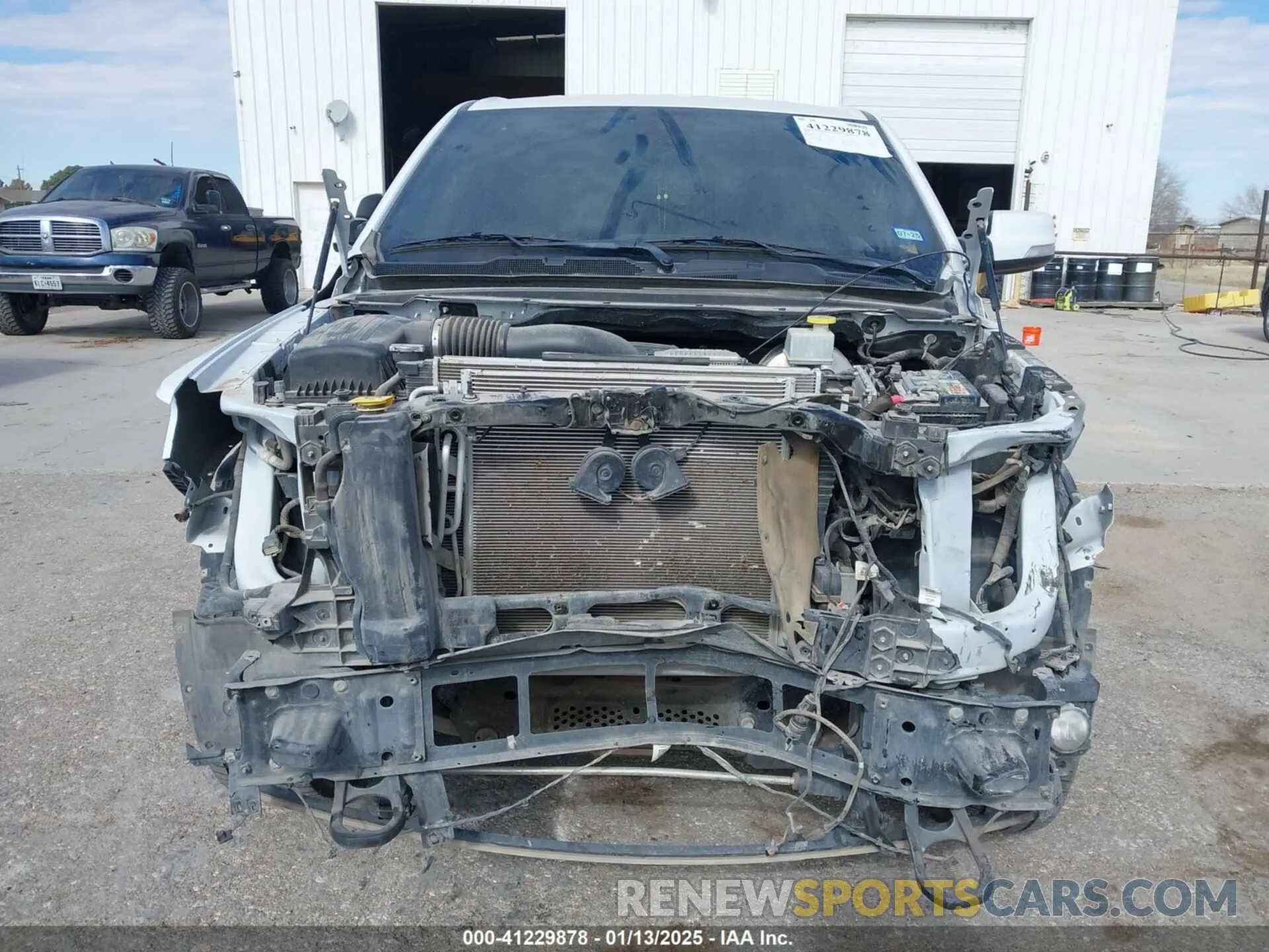 12 Photograph of a damaged car 1C6SRFFT5MN650476 RAM 1500 2021