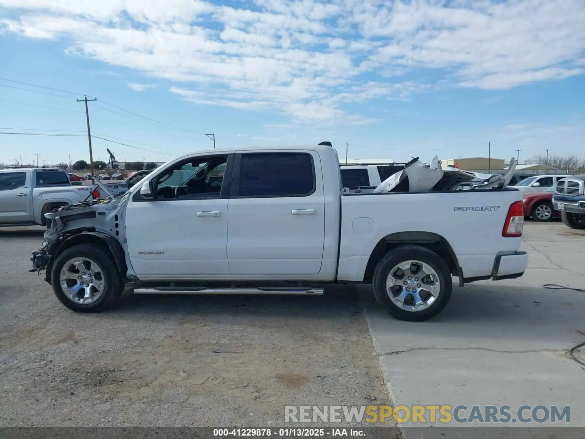 14 Photograph of a damaged car 1C6SRFFT5MN650476 RAM 1500 2021
