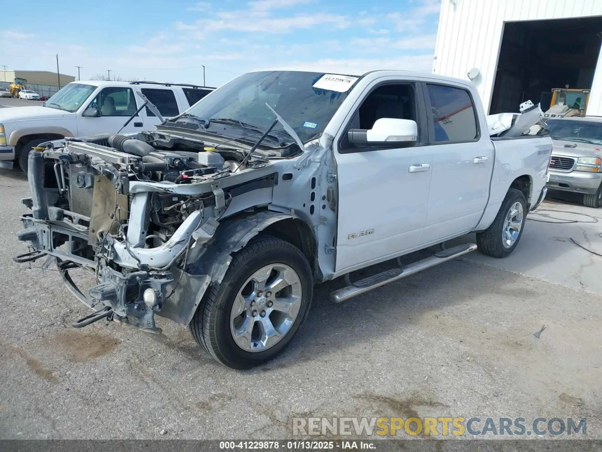 2 Photograph of a damaged car 1C6SRFFT5MN650476 RAM 1500 2021